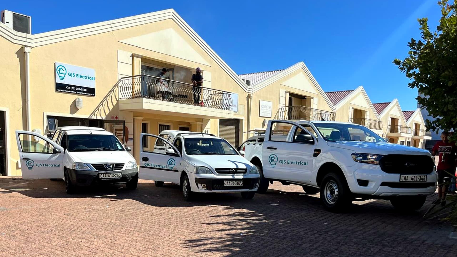 GJS Electrical office with branded fleet vehicles